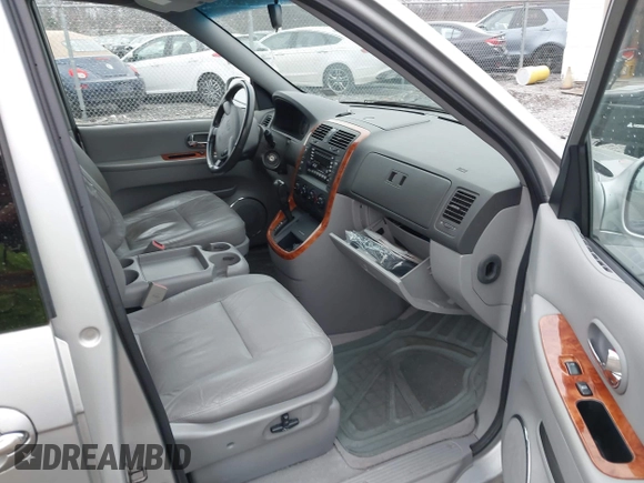 2004 Kia Sedona LX with VIN KNDUP131546535352, listed as a IAAI auction lot 41856784 with 128,943 mi miles. Bid and sale history available at carsss.com. Image 5.