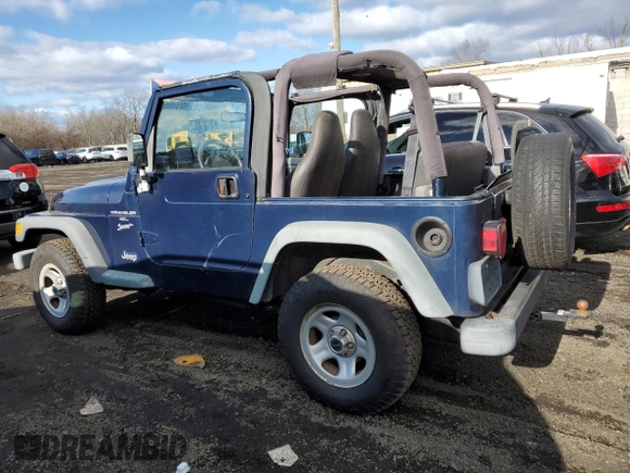 2000 Jeep Wrangler Sport with VIN 1J4FA49S2YP803165, listed as a Copart auction lot 85611904 with 192,427 mi miles and Non repairable. Bid and sale history available at DreamBid. Image 2.