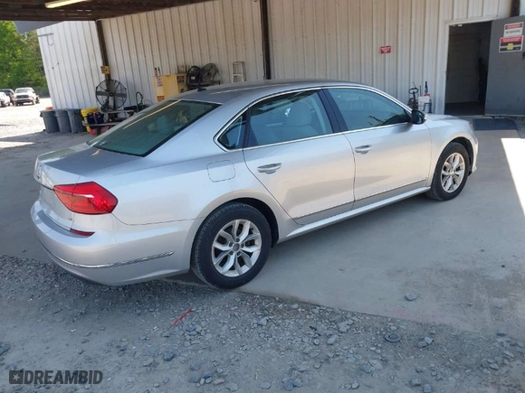 2016 Volkswagen Passat 1.8T S with VIN 1VWAS7A38GC031521, listed as a IAAI auction lot 42069429 with 94,938 mi miles. Bid and sale history available at carsss.com. Image 4.