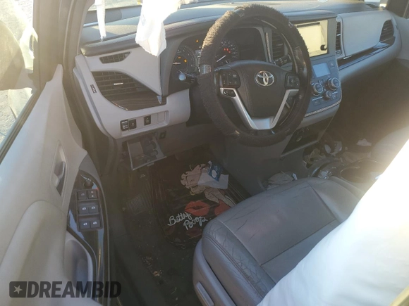 2016 Toyota Sienna XLE с VIN 5TDYK3DC6GS691111, выставлен на аукционе Copart как лот 87195014 с пробегом 196 691 миль миль и Списание • Salvage title. История ставок и продаж доступна на DreamBid. Изображение 8.