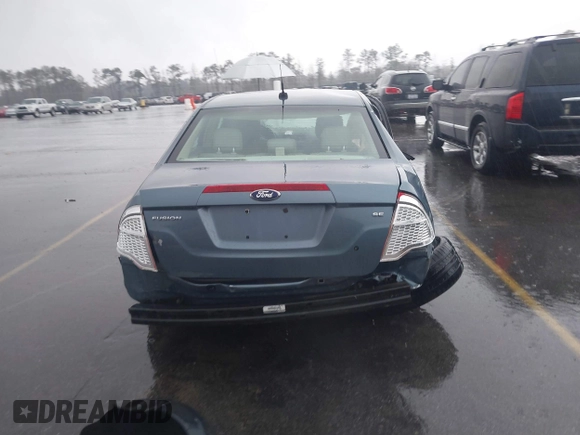 2012 Ford Fusion SE z VIN 3FAHP0HA6CR446630, wystawiony jako IAAI lot #41743485 z przebiegiem 139 547 mil mil oraz . Historia ofert i sprzedaży dostępna na DreamBid. Obrazek 17.
