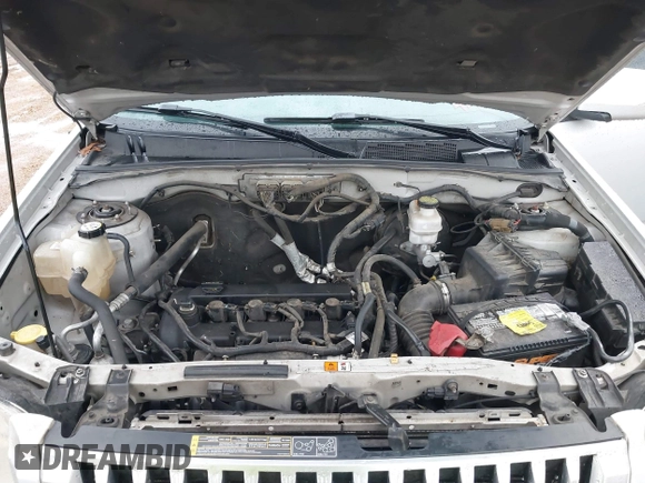 2010 Mercury Mariner Premier with VIN 4M2CN8H71AKJ17925, listed as a IAAI auction lot 41450154 with 247,651 mi miles and . Bid and sale history available at DreamBid. Image 10.