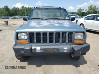 1997 Jeep Cherokee Sport with VIN 1J4FJ68S4VL607745, listed as a Copart auction lot 67521394 with 143,814 mi miles and Clean Title. Bid and sale history available at carsss.com. Image 5.