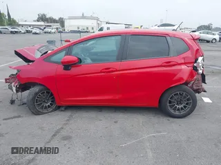2015 Honda Fit LX with VIN 3HGGK5H5XFM775385, listed as a IAAI auction lot 42555319 with 81,615 mi miles and . Bid and sale history available at DreamBid. Image 15.