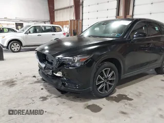 2017 Mazda CX-5 Grand Touring with VIN JM3KFBDL6H0143013, listed as a IAAI auction lot 41912979 with 122,890 mi miles. Bid and sale history available at carsss.com. Image 17.
