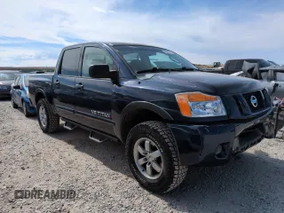 2011 Nissan Titan Pro-4X with VIN 1N6BA0EC3BN322837, listed as a Copart auction lot 60617675 with 196,657 mi miles and Salvage title. Bid and sale history available at DreamBid. Image 4.