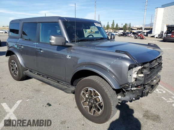 2023 Ford Bronco with VIN 1FMEE5DP0PLB97820, listed as a Copart auction lot 50392985 with 29,950 mi miles and Salvage Title. Bid and sale history available at DreamBid. Image 4.