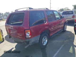 1999 Ford Explorer XLT with VIN 1FMZU35PXXZA67080, listed as a IAAI auction lot 42228465 with 212,488 mi miles and . Bid and sale history available at DreamBid. Image 4.