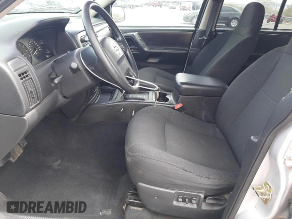 2004 Jeep Grand Cherokee Laredo with VIN 1J4GW48S34C339876, listed as a Copart auction lot 52428045 with 229,606 mi miles and Salvage Title. Bid and sale history available at carsss.com. Image 7.