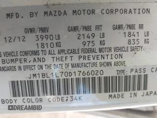 2013 Mazda 3 i Touring with VIN JM1BL1L70D1766020, listed as a IAAI auction lot 41548499 with 236,833 mi miles and . Bid and sale history available at carsss.com. Image 9.