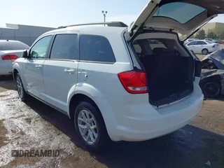 2014 Dodge Journey SE with VIN 3C4PDCAB0ET293641, listed as a IAAI auction lot 42001844 with 138,740 mi miles. Bid and sale history available at carsss.com. Image 3.