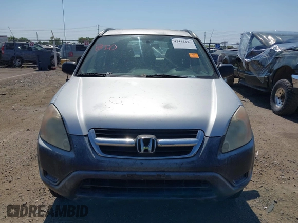 2003 Honda CR-V LX z VIN JHLRD68453C004928, wystawiony jako IAAI lot #42452176 z przebiegiem 258 092 mil mil oraz . Historia ofert i sprzedaży dostępna na DreamBid. Obrazek 6.