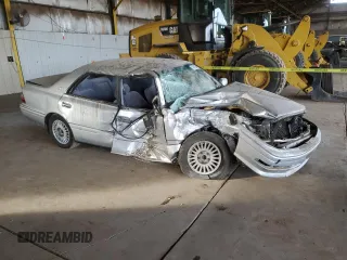 1997 Toyota Crown z VIN JZS1510058113, wystawiony jako Copart lot #84561364 z przebiegiem 71 242 mil mil oraz Szkoda całkowita • Salvage title. Historia ofert i sprzedaży dostępna na DreamBid. Obrazek 4.
