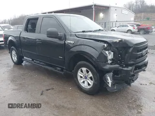 2015 Ford F-150 XLT with VIN 1FTEW1EP2FFB96318, listed as a IAAI auction lot 41578663 with 143,560 mi miles. Bid and sale history available at carsss.com. Image 1.