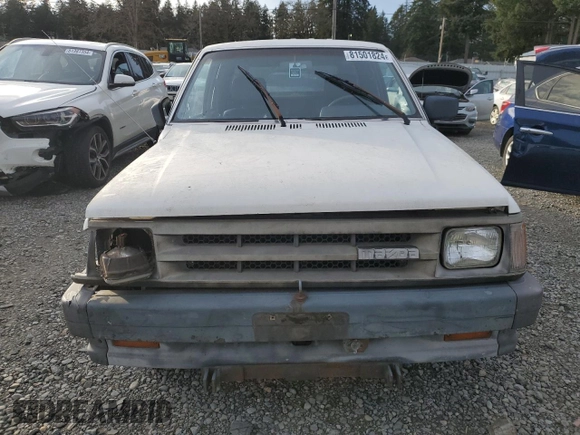 1989 Mazda B-Series Truck z VIN JM2UF3136K0755419, wystawiony jako Copart lot #81501824 z przebiegiem 113 124 mil mil oraz Szkoda całkowita • Salvage title. Historia ofert i sprzedaży dostępna na DreamBid. Obrazek 5.