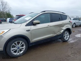 2017 Ford Escape SE with VIN 1FMCU0G99HUE68587, listed as a IAAI auction lot 41924307 with 89,609 mi miles. Bid and sale history available at carsss.com. Image 6.