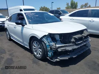 2023 Honda Civic Sport with VIN 2HGFE2F52PH519889, listed as a IAAI auction lot 42429626 with 23,209 mi miles and . Bid and sale history available at DreamBid. Image 1.