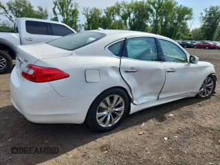 2013 Infiniti M with VIN JN1BY1AR5DM602690, listed as a Copart auction lot 64944925 with 186,302 mi miles and Salvage title. Bid and sale history available at DreamBid. Image 3.