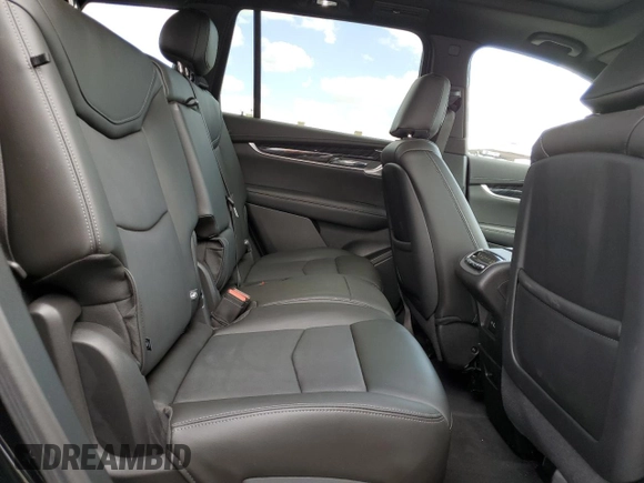 2023 Cadillac XT6 FWD Premium Luxury with VIN 1GYKPCRS5PZ220616, listed as a Copart auction lot 56913725 with 25,860 mi miles and Salvage title. Bid and sale history available at DreamBid. Image 11.