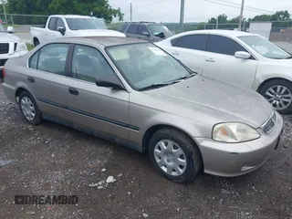 2000 Honda Civic LX z VIN 1HGEJ6675YL037812, wystawiony jako IAAI lot #42504129 z przebiegiem 72 001 mil mil oraz . Historia ofert i sprzedaży dostępna na DreamBid. Obrazek 1.