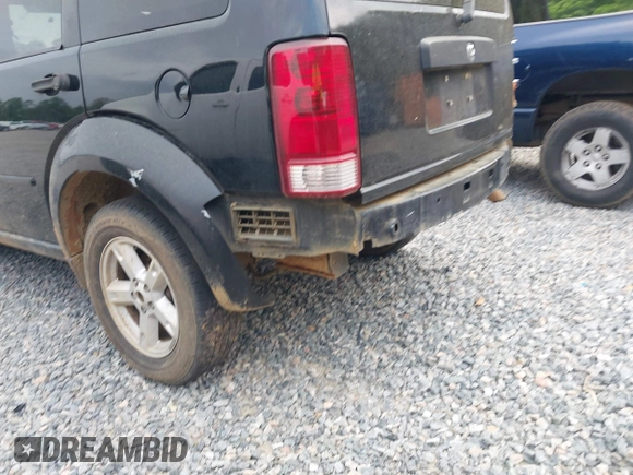 2007 Dodge Nitro SXT z VIN 1D8GU28K97W727361, wystawiony jako IAAI lot #42142970 z przebiegiem 144 579 mil mil oraz . Historia ofert i sprzedaży dostępna na DreamBid. Obrazek 6.