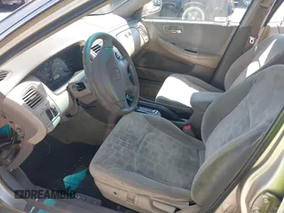 2001 Honda Accord EX z VIN 1HGCG66861A114106, wystawiony jako IAAI lot #42385834 z przebiegiem 172 395 mil mil oraz . Historia ofert i sprzedaży dostępna na DreamBid. Obrazek 5.