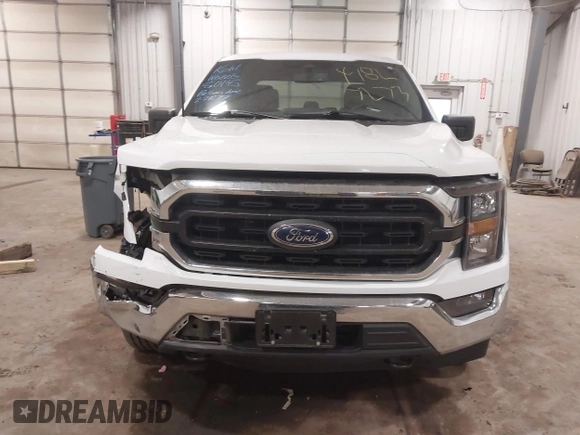 2023 Ford F-150 XL with VIN 1FTFW1ED6PFC14587, listed as a IAAI auction lot 41827273 with 87,267 mi miles. Bid and sale history available at carsss.com. Image 12.