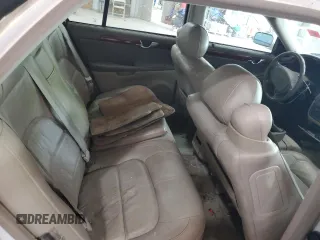 2004 Cadillac DeVille z VIN 1G6KD54Y84U137828, wystawiony jako Copart lot #53702265 z przebiegiem 156 439 mil mil oraz Szkody całkowita. Historia ofert i sprzedaży dostępna na DreamBid. Obrazek 10.