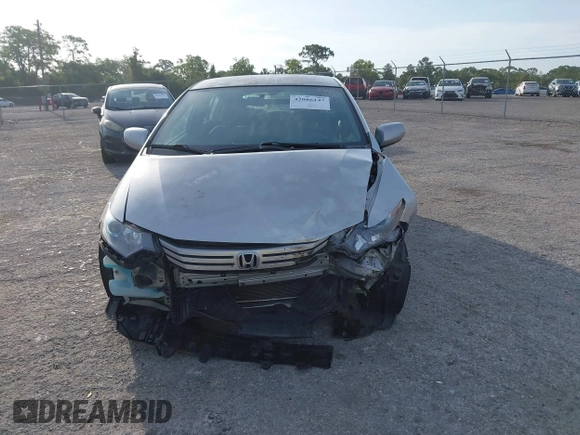 2010 Honda Insight LX with VIN JHMZE2H55AS039854, listed as a IAAI auction lot 42086147 with 153,555 mi miles and . Bid and sale history available at DreamBid. Image 12.