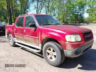 2005 Ford Explorer Sport Trac XLS z VIN 1FMZU77K95UB13467, wystawiony jako IAAI lot #42142049 z przebiegiem 164 156 mil mil oraz . Historia ofert i sprzedaży dostępna na DreamBid. Obrazek 1.