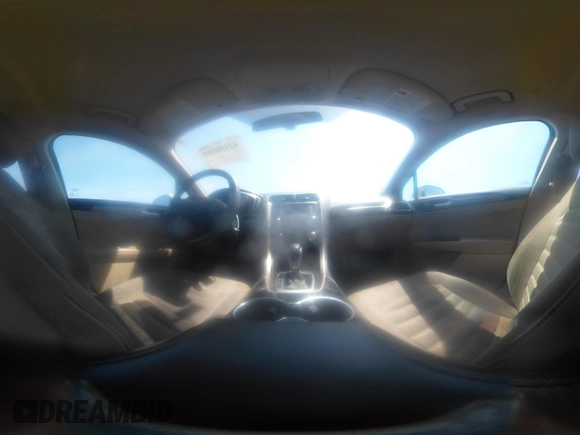2014 Ford Fusion SE Hybrid with VIN 3FA6P0LU8ER251057, listed as a IAAI auction lot 42150589 with 188,192 mi miles and . Bid and sale history available at DreamBid. Image 18.