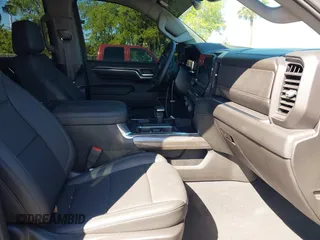 2024 Chevrolet Silverado 1500 LTZ with VIN 1GCUDGE81RZ298421, listed as a IAAI auction lot 41775039 with 6,900 mi miles and . Bid and sale history available at DreamBid. Image 5.
