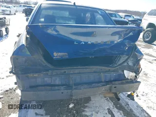 2003 Mitsubishi Lancer ES with VIN JA3AJ26E13U0A3996, listed as a IAAI auction lot 41251250 with 223,311 mi miles. Bid and sale history available at carsss.com. Image 6.