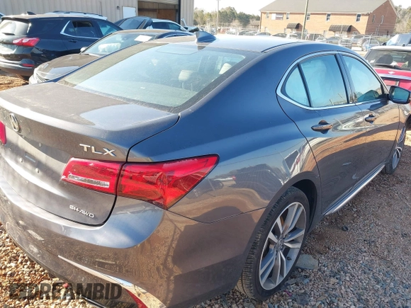 2020 Acura TLX w/Technology Pkg with VIN 19UUB3F49LA003406, listed as a IAAI auction lot 41352592 with 73,125 mi miles. Bid and sale history available at carsss.com. Image 4.