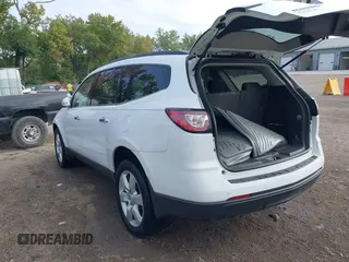 2017 Chevrolet Traverse LT with VIN 1GNKRGKD4HJ338716, listed as a IAAI auction lot 40265414 with 131,097 mi miles and . Bid and sale history available at DreamBid. Image 3.