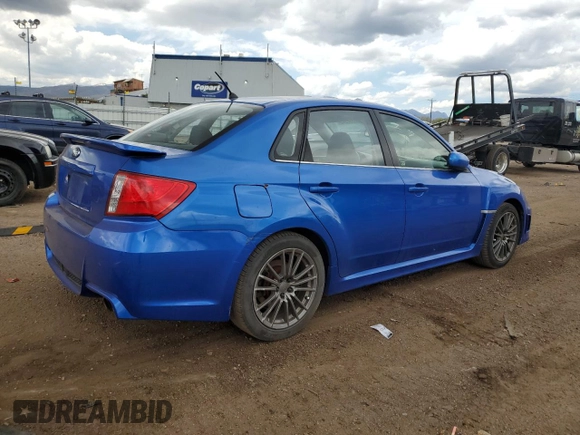 2012 Subaru WRX WRX with VIN JF1GV7E6XCG023762, listed as a Copart auction lot 56332545 with 127,263 mi miles and Salvage title. Bid and sale history available at DreamBid. Image 3.