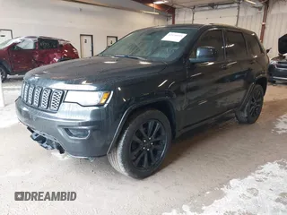 2017 Jeep Grand Cherokee Laredo with VIN 1C4RJFAG3HC841307, listed as a IAAI auction lot 42326035 with 132,655 mi miles and . Bid and sale history available at DreamBid. Image 17.