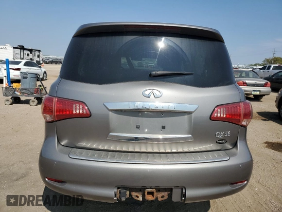 2012 Infiniti QX56 7-passenger with VIN JN8AZ2NE9C9016258, listed as a Copart auction lot 71570824 with 142,859 mi miles and Salvage Title. Bid and sale history available at carsss.com. Image 6.
