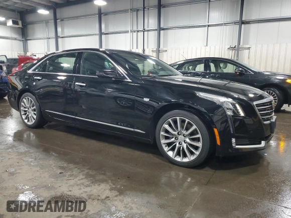 2018 Cadillac CT6 Luxury AWD z VIN 1G6KD5RSXJU102871, wystawiony jako Copart lot #54579165 z przebiegiem 31 219 mil mil oraz Szkoda całkowita • Salvage title. Historia ofert i sprzedaży dostępna na DreamBid. Obrazek 4.