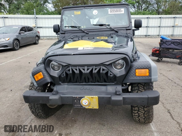 2005 Jeep Wrangler Unlimited with VIN 1J4FA44S75P358246, listed as a Copart auction lot 60958695 with 150,003 mi miles and Salvage title. Bid and sale history available at DreamBid. Image 5.