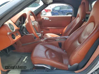 2005 Porsche Boxster S z VIN WP0CB29825S730662, wystawiony jako Copart lot #58700875 z przebiegiem 80 861 mil mil oraz Tytuł czysty. Historia ofert i sprzedaży dostępna na DreamBid. Obrazek 7.