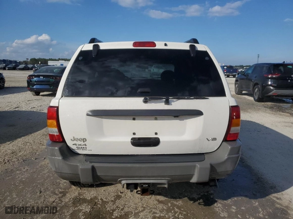2002 Jeep Grand Cherokee Laredo with VIN 1J4GW48N02C205818, listed as a Copart auction lot 44737205 with 136,030 mi miles and Salvage Title. Bid and sale history available at carsss.com. Image 6.
