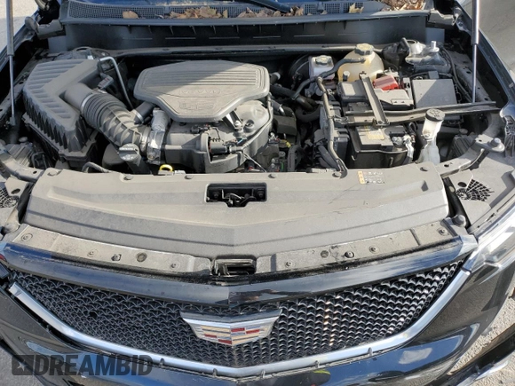 2021 Cadillac XT6 Sport z VIN 1GYKPGRS0MZ215942, wystawiony jako Copart lot #84830084 z przebiegiem 29 930 mil mil oraz Szkoda całkowita • Salvage title. Historia ofert i sprzedaży dostępna na DreamBid. Obrazek 14.