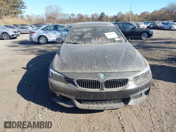 2019 BMW 4 Series 440i xDrive with VIN WBA4J7C52KBM75345, listed as a IAAI auction lot 40613703 with 31,402 mi miles and . Bid and sale history available at carsss.com. Image 12.