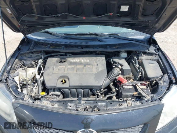 2009 Toyota Corolla with VIN 1NXBU40E29Z085117, listed as a IAAI auction lot 42059893 with 199,576 mi miles. Bid and sale history available at carsss.com. Image 10.