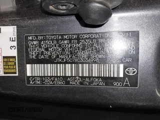 2012 Scion tC with VIN JTKJF5C7XC3034998, listed as a IAAI auction lot 41591632 with 171,121 mi miles. Bid and sale history available at carsss.com. Image 9.