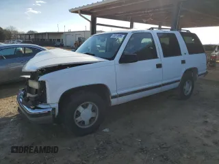 1999 GMC Yukon with VIN 1GKEC13R0XJ811710, listed as a Copart auction lot 43014995 with 311,948 mi miles and Salvage Title. Bid and sale history available at carsss.com. Image 1.