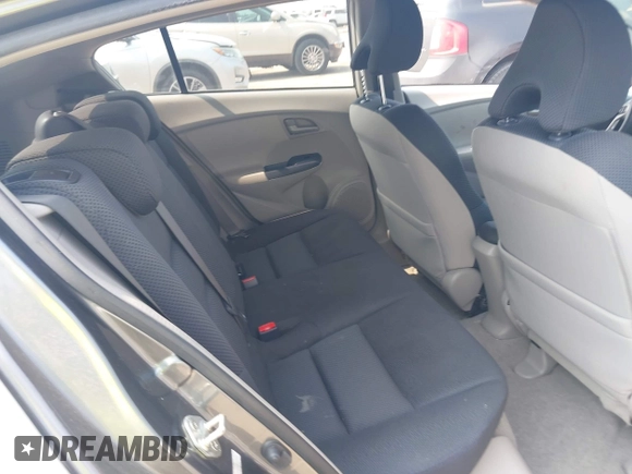 2010 Honda Insight EX with VIN JHMZE2H71AS043465, listed as a IAAI auction lot 42312556 with 151,009 mi miles and . Bid and sale history available at DreamBid. Image 8.