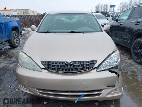 2002 Toyota Camry XLE z VIN 4T1BF32K42U533788, wystawiony jako IAAI lot #42024918 z przebiegiem 120 168 mil mil oraz . Historia ofert i sprzedaży dostępna na DreamBid. Obrazek 12.
