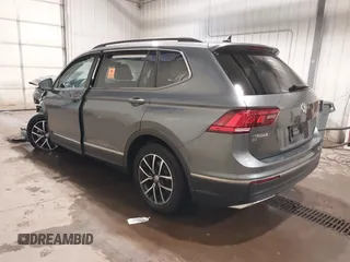 2021 Volkswagen Tiguan SE with VIN 3VV3B7AX3MM118463, listed as a IAAI auction lot 42138702 with 48,058 mi miles and . Bid and sale history available at DreamBid. Image 3.